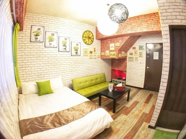 Imagen de la habitación del Hotel Green Mu. Foto 25