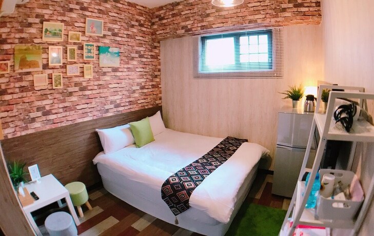 Imagen de la habitación del Hotel Green Mu. Foto 27