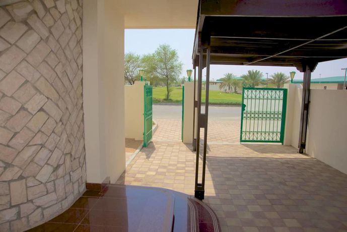 Imagen de la habitación del Hotel Green Mubazzarah Chalets. Foto 5