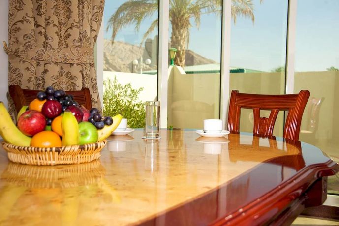 Imagen de la habitación del Hotel Green Mubazzarah Chalets. Foto 9