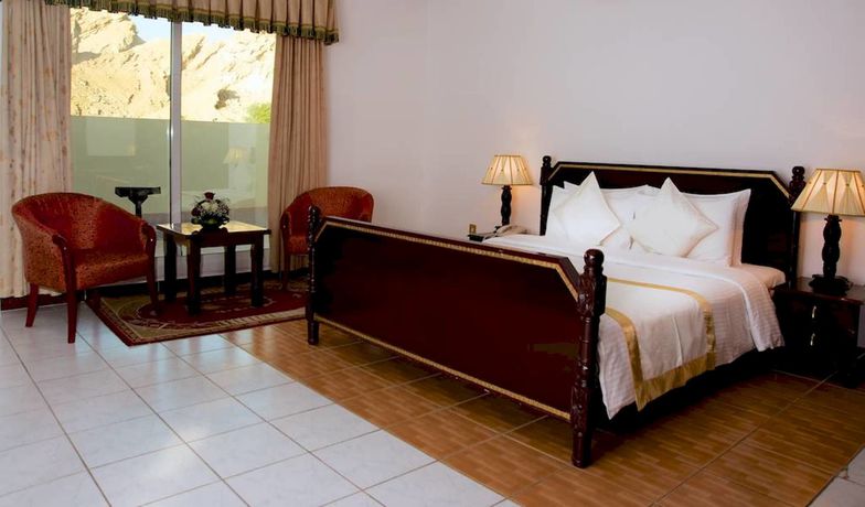 Imagen de la habitación del Hotel Green Mubazzarah Chalets. Foto 12