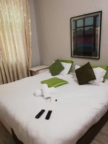 Imagen de la habitación del Hotel Green On Minni Guest House. Foto 6