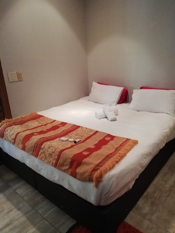 Imagen de la habitación del Hotel Green On Minni Guest House. Foto 9
