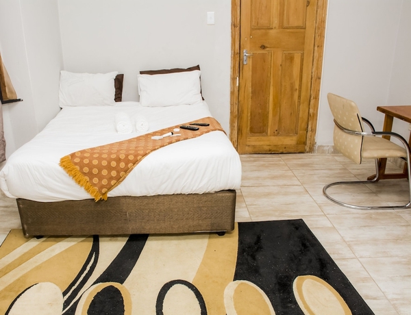 Imagen de la habitación del Hotel Green On Minni Guest House. Foto 10
