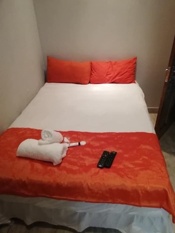 Imagen de la habitación del Hotel Green On Minni Guest House. Foto 12