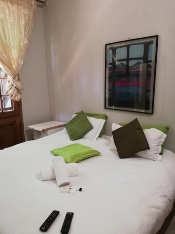 Imagen de la habitación del Hotel Green On Minni Guest House. Foto 14