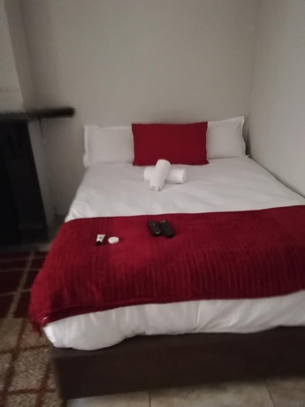 Imagen de la habitación del Hotel Green On Minni Guest House. Foto 15