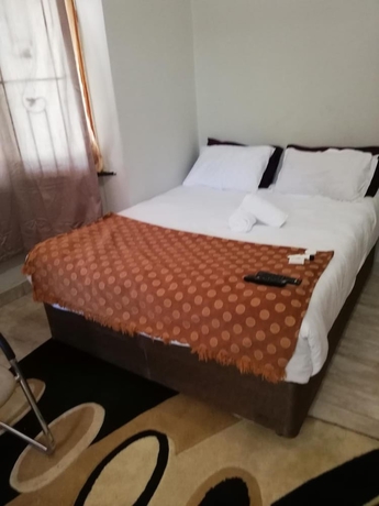 Imagen de la habitación del Hotel Green On Minni Guest House. Foto 17