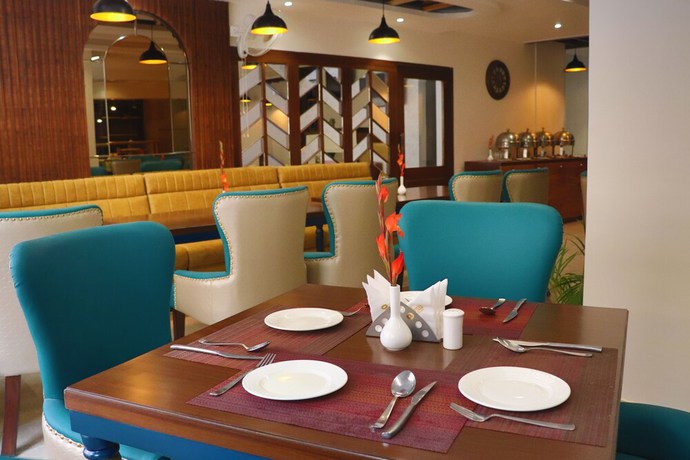 Imagen del bar/restaurante del Hotel Green One Earth. Foto 4