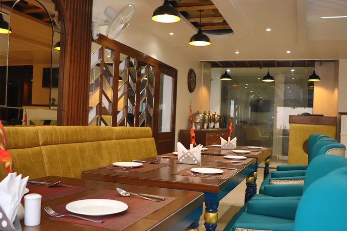 Imagen del bar/restaurante del Hotel Green One Earth. Foto 5