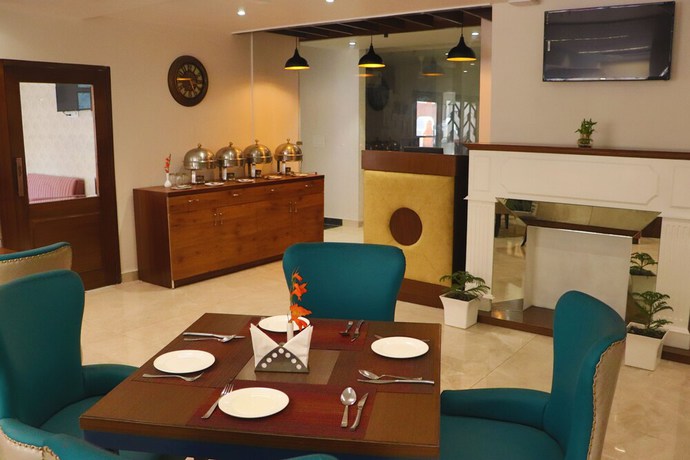 Imagen del bar/restaurante del Hotel Green One Earth. Foto 8
