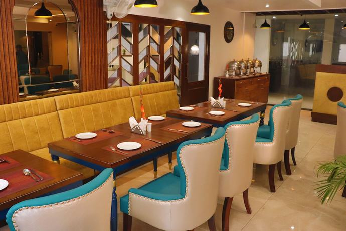 Imagen del bar/restaurante del Hotel Green One Earth. Foto 9