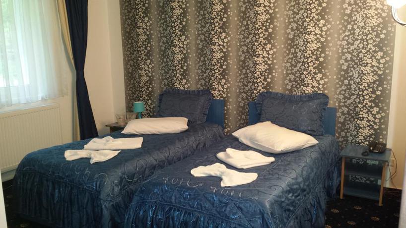 Imagen de la habitación del Hotel Green Palace. Foto 8