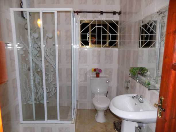 Imagen de la habitación del Hotel Green Palm Self Catering and Chalets. Foto 8