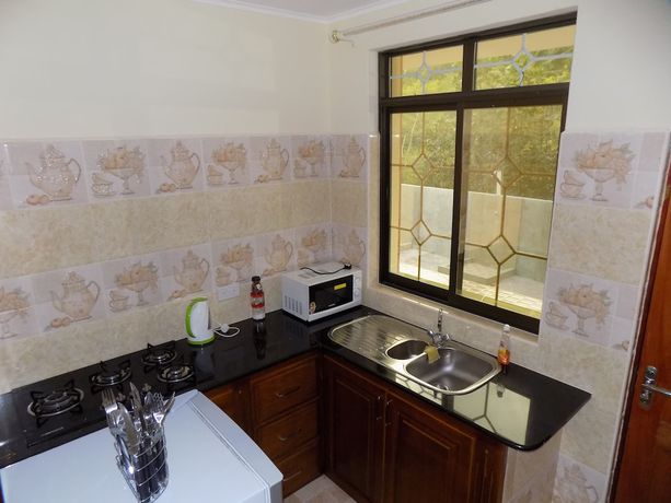 Imagen de la habitación del Hotel Green Palm Self Catering and Chalets. Foto 11
