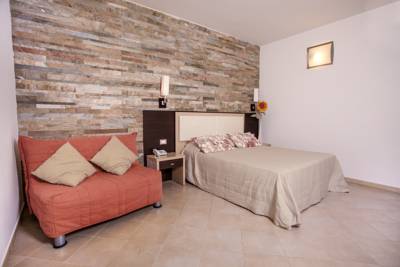 Imagen de la habitación del Hotel Green Paradise Alimini Resort. Foto 6