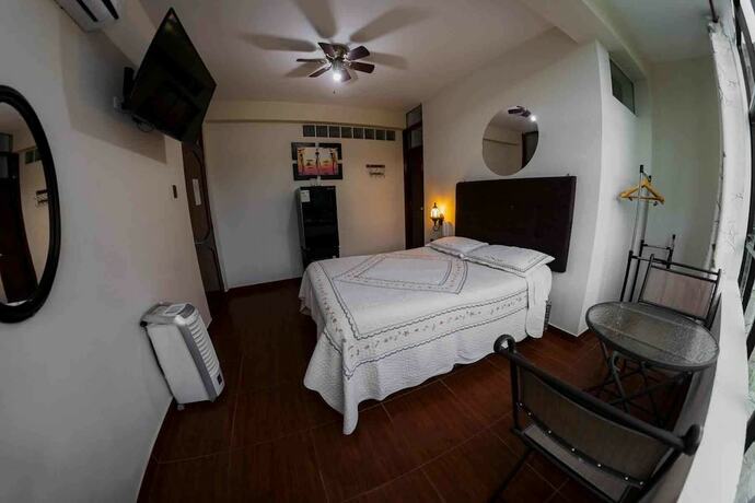 Imagen de la habitación del Hotel Green Paradise hotel. Foto 18