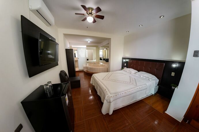 Imagen de la habitación del Hotel Green Paradise hotel. Foto 19