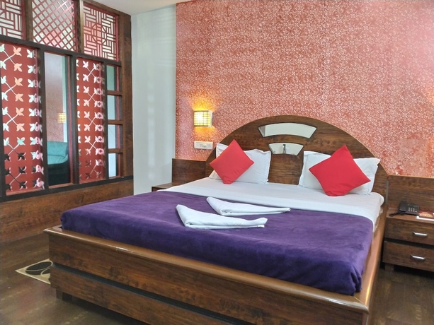 Imagen de la habitación del Hotel Green Point Resort. Foto 9