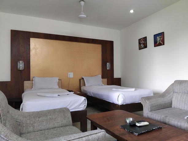 Imagen de la habitación del Hotel Green Point Resort. Foto 13