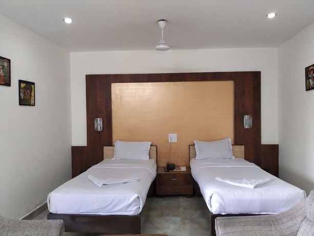 Imagen de la habitación del Hotel Green Point Resort. Foto 16