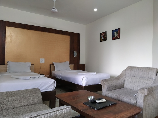 Imagen de la habitación del Hotel Green Point Resort. Foto 17