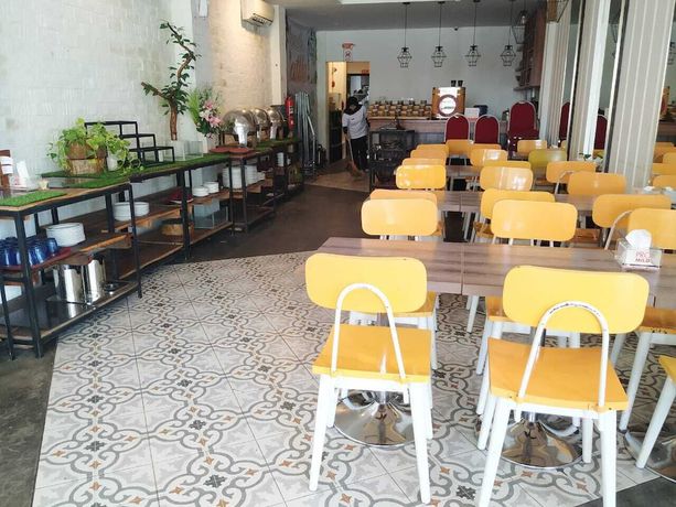 Imagen del bar/restaurante del Hotel Green Red Hotel Syariah Jombang. Foto 7