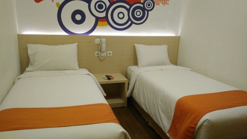 Imagen de la habitación del Hotel Green Red Hotel Syariah Jombang. Foto 14