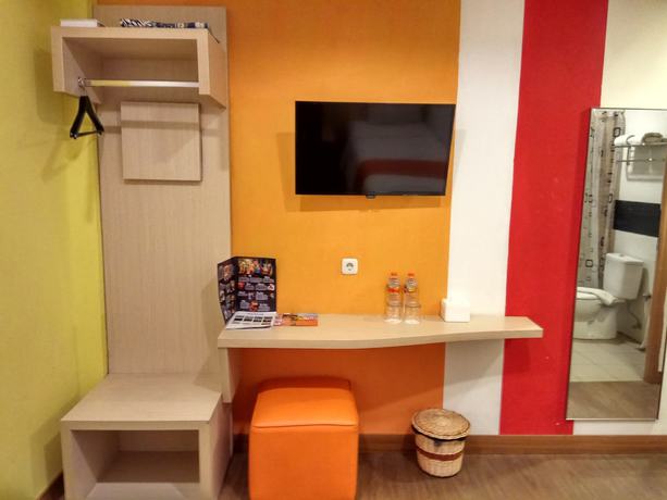 Imagen de la habitación del Hotel Green Red Hotel Syariah Jombang. Foto 15