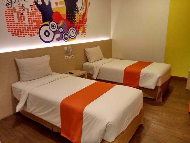 Imagen de la habitación del Hotel Green Red Hotel Syariah Jombang. Foto 16