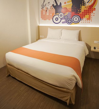 Imagen de la habitación del Hotel Green Red Hotel Syariah Jombang. Foto 17