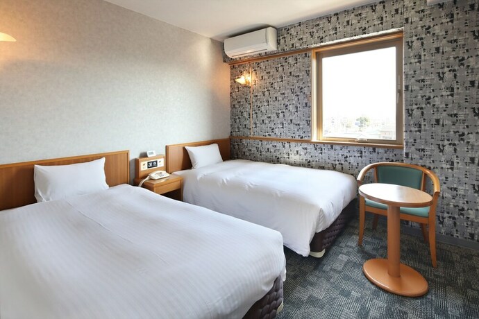 Imagen de la habitación del Hotel Green Rich Aso Kumamoto Airport. Foto 17