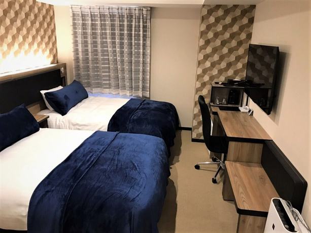 Imagen de la habitación del Hotel Green Rich Kobe Sannomiya. Foto 2