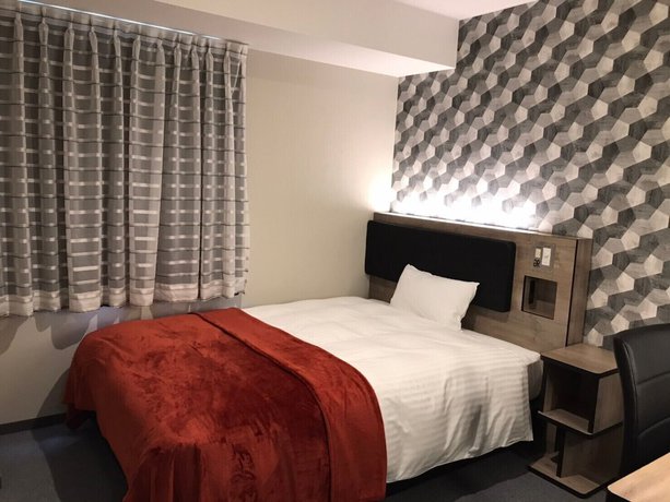 Imagen de la habitación del Hotel Green Rich Kobe Sannomiya. Foto 18