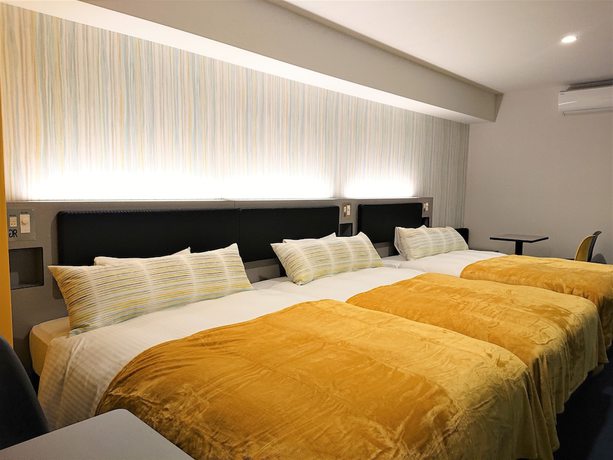 Imagen de la habitación del Hotel Green Rich Kobe Sannomiya. Foto 19