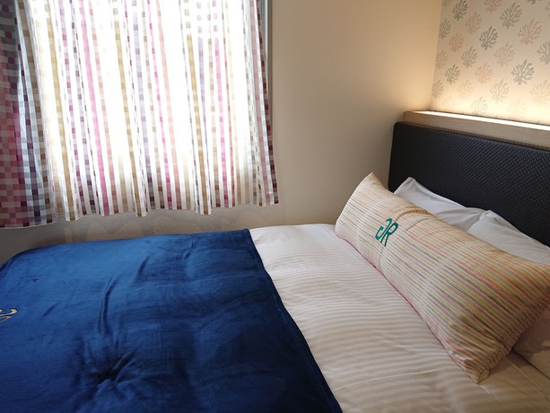 Imagen de la habitación del Hotel Green Rich Okinawa Nago. Foto 6