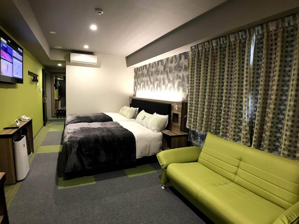 Imagen de la habitación del Hotel Green Rich Okinawa Nago. Foto 9