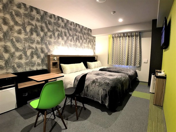 Imagen de la habitación del Hotel Green Rich Okinawa Nago. Foto 14