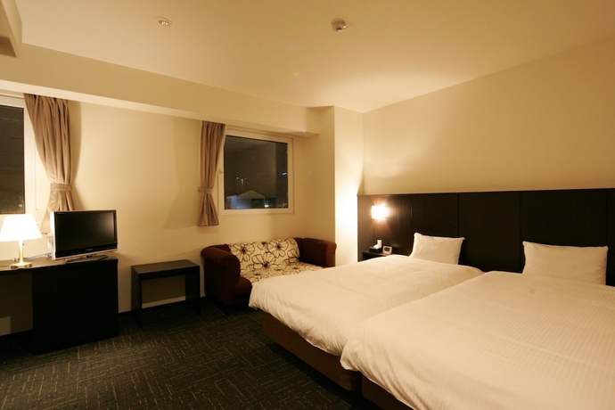 Imagen de la habitación del Hotel Green Rich Tosu Ekimae. Foto 12