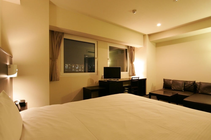 Imagen de la habitación del Hotel Green Rich Tosu Ekimae. Foto 13