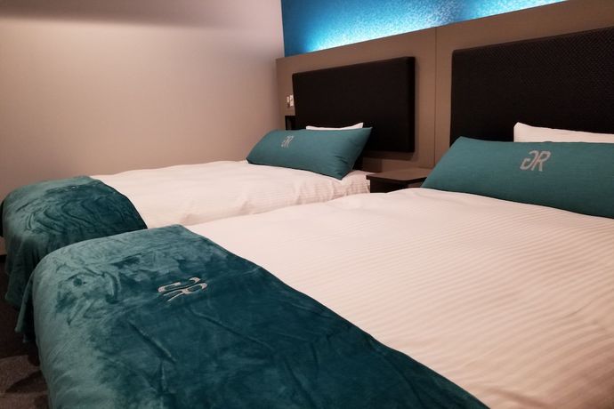 Imagen de la habitación del Hotel Green Rich andcapsule Naha Jinko Onsen Futamata Yunohana. Foto 5