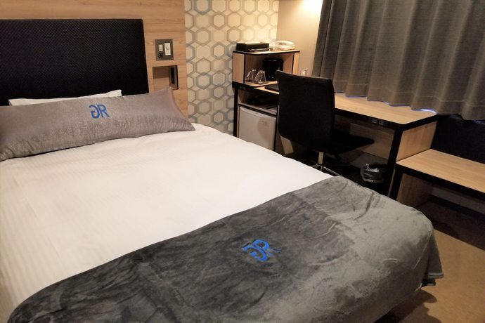 Imagen de la habitación del Hotel Green Rich andcapsule Naha Jinko Onsen Futamata Yunohana. Foto 7