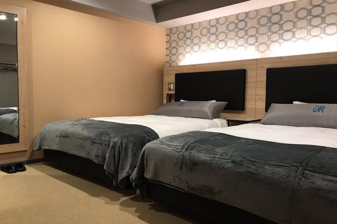 Imagen de la habitación del Hotel Green Rich andcapsule Naha Jinko Onsen Futamata Yunohana. Foto 8