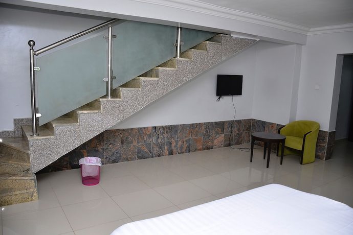 Imagen de la habitación del Hotel Green Suites Villa. Foto 2