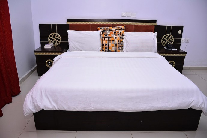 Imagen de la habitación del Hotel Green Suites Villa. Foto 5