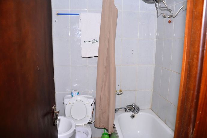 Imagen de la habitación del Hotel Green Suites Villa. Foto 7