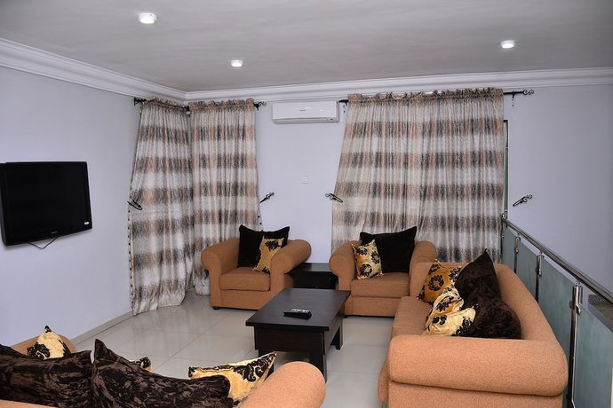 Imagen de la habitación del Hotel Green Suites Villa. Foto 8