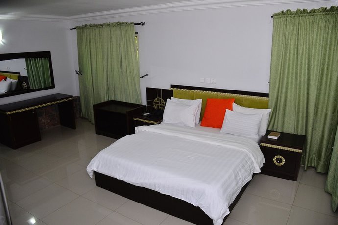Imagen de la habitación del Hotel Green Suites Villa. Foto 9