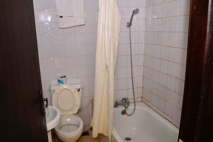 Imagen de la habitación del Hotel Green Suites Villa. Foto 10