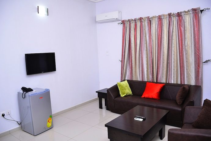 Imagen de la habitación del Hotel Green Suites Villa. Foto 11